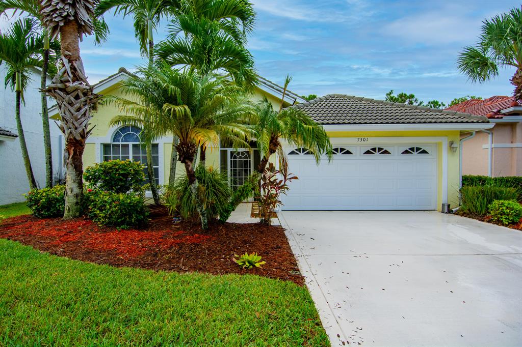 Located in Martin County in the fabulous gated community of Mariner Village this beautiful well maintained 4 bed,2 full bath, 2 car garage pool home is awaiting its new owners. As you walk into the large foyer area, you will immediately admire all the upgrades this home has to offer. Travertine and wood floors, a chef's kitchen with 42'' cabinets, granite countertops and backsplash, newer stainless steel appliances, custom drapery and central vacuum just to name a few . You will fall in love with the large open living area that leads to an outdoor private paradise with a screened in-ground pool with a large covered lanai that backs up to a natural preserve. This popular model offers a large Master Suite with walk in closets. Updated and move in ready.