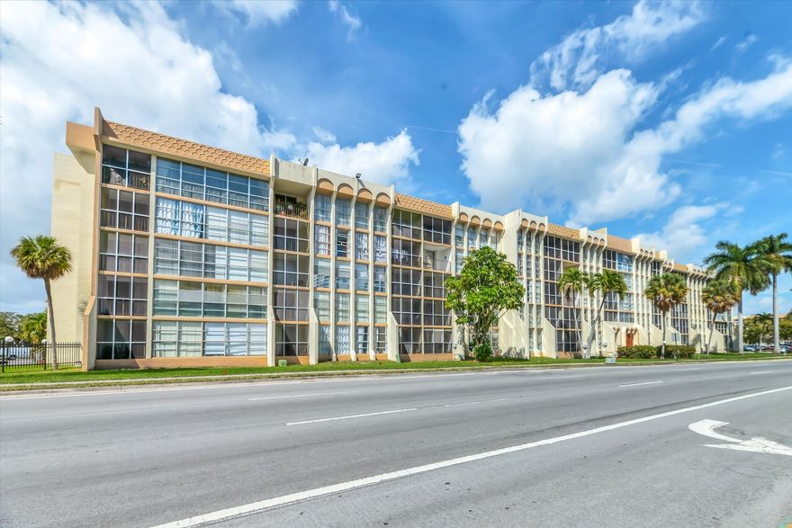 Top floor 1 bedroom, 1.5 bath condo with stunning sunset views and no neighbors above. Enjoy water views from the balcony, living room, kitchen and bedroom. Lovingly maintained and mostly original, offering the perfect opportunity to update to your style. Some furnishings included. Reserved parking space just outside the building exit. Easy to show. Desirable all ages community with pool, tennis and amenities. Condo fee includes water, sewer and cable TV. Steps to Joseph Scavo Park and close to shopping, dining and the beach. Ideal for end users or investors.  Call to see today!