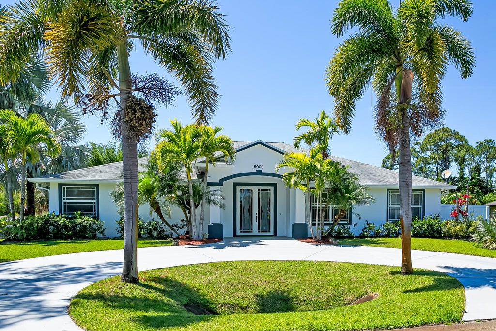 Photo of 5903 Papaya Drive, Fort Pierce, FL 34982 (MLS # R10976155)