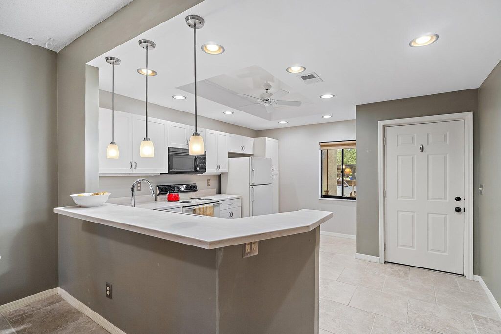 Photo of 6503 SE Williamsburg Drive #104, Hobe Sound, FL 33455 (MLS # B26019762)