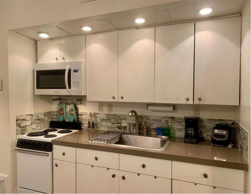 Photo of 2710 Riverside Drive #203-a, Coral Springs, FL 33065 (MLS # B26029782)