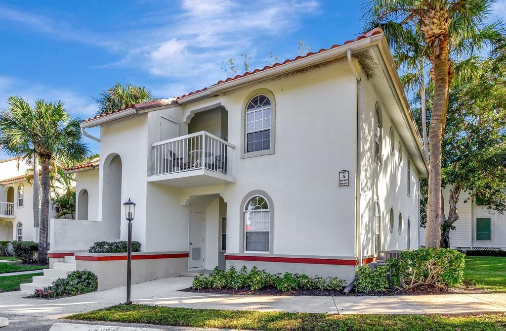 Photo of 137 Cypress Point Drive, Palm Beach Gardens, FL 33418 (MLS # R10943786)