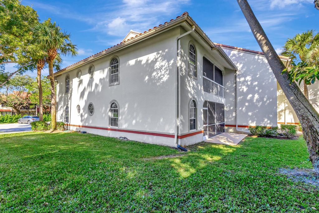 Photo of 137 Cypress Point Drive, Palm Beach Gardens, FL 33418 (MLS # R10943786)