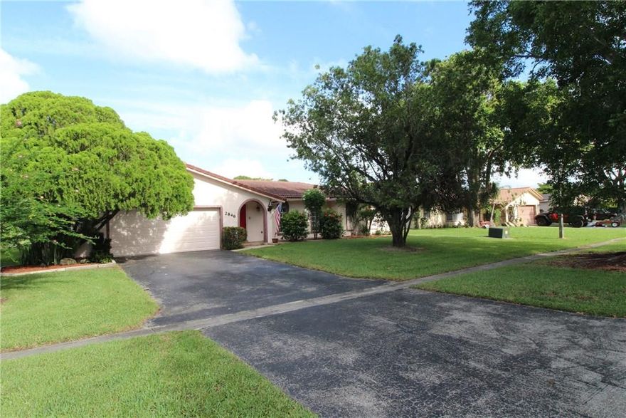 5/2 home on a quiet Country Club West street away from Coral Ridge Drive. Large back yard has fantastic long canal views and of Three Friends Park!!! Great schools, close to SportsPlex, Highway 869 (Sawgrass Expressway), shopping etc... New carpet in 3 bedrooms, also new carpet in covered/screened patio, laminate flooring in dining, living and master bedroom, updated second bath to accommodate handicap persons, new electrical panel. Impact panels for back of home, hurricane garage door. No HOA!!!