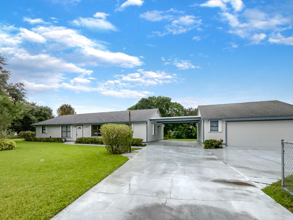Photo of 5721 Dryden Road, West Palm Beach, FL 33415 (MLS # R10999908)
