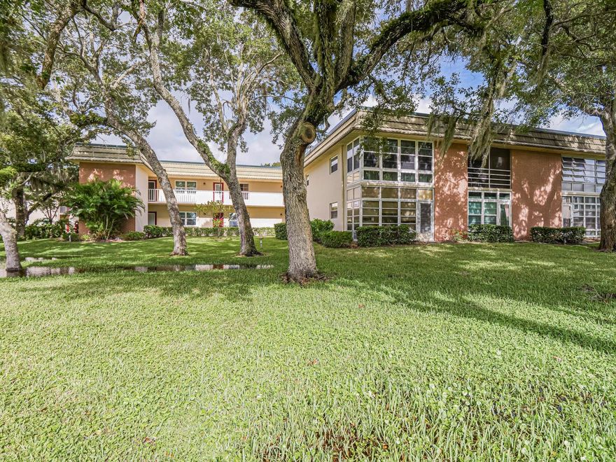 Come see this lovely, move in ready, 2 bedroom, 2 bath "B" plan. Freshly painted throughout in a soft, pleasing color palette. Gorgeous wide plank luxury vinyl flooring in the kitchen, dining room, living room & lanai. New water heater. A/C 2020. New electrical circuit breaker panel. Newer washer/dryer. There's a lot to love here. Vista Gardens is a very active, well run 55+ community in a beautiful wooded setting. On site public golf course. Far too many amenities to list here (See below). Just minutes to the beach, shopping, dining, cultural arts, healthcare & more. Room sizes approximate.