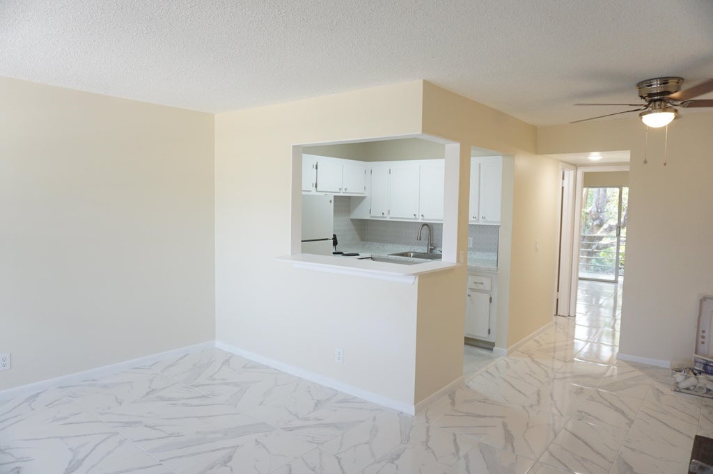 Photo of 33 Windsor B, West Palm Beach, FL 33417 (MLS # B26077244)