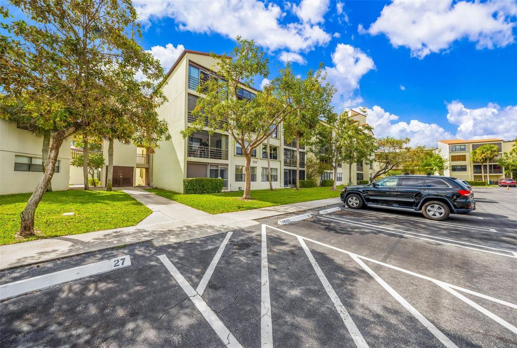 Photo of 2312 S Cypress Bend Drive #105, Pompano Beach, FL 33069 (MLS # F10471784)