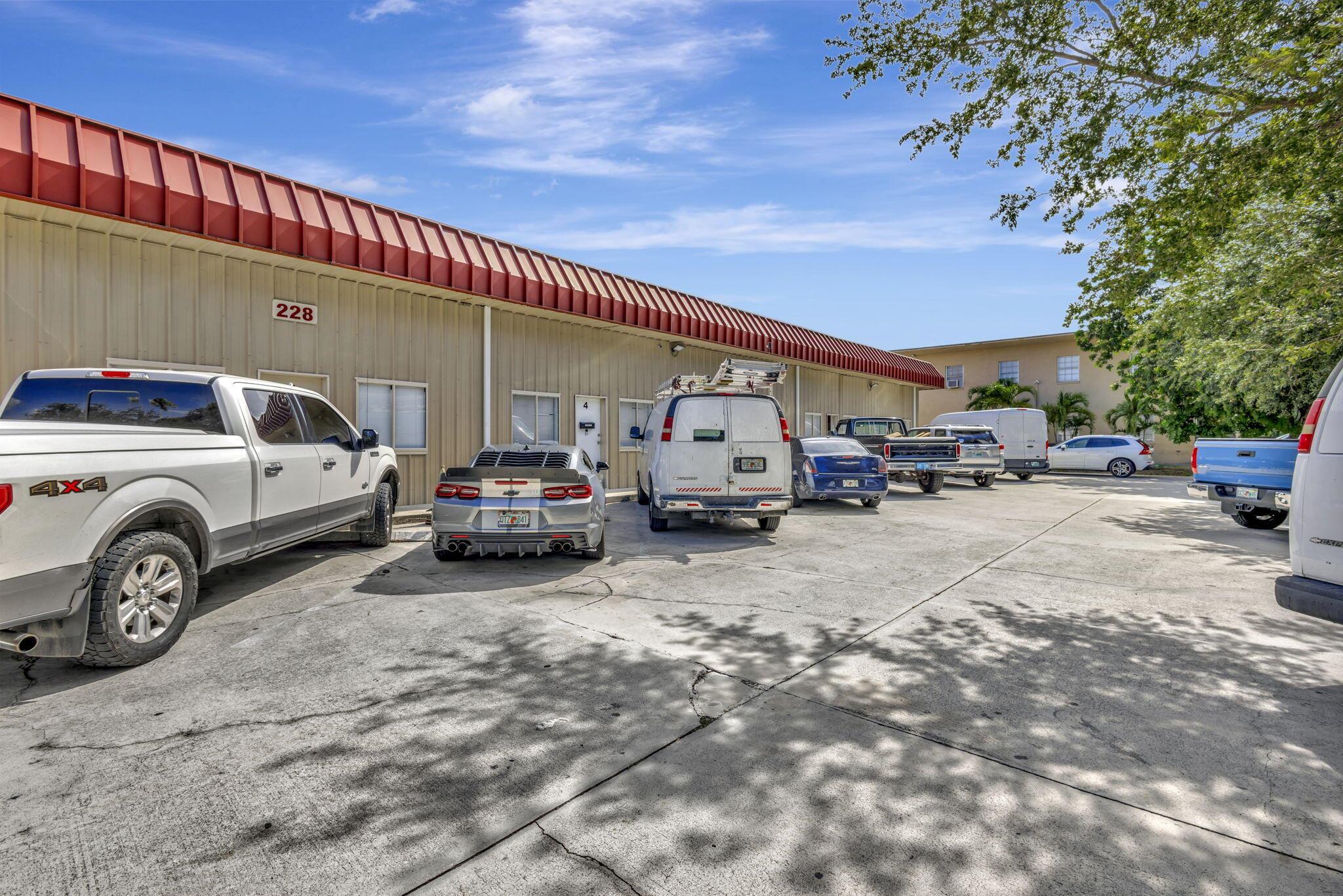 AMAZING OPPORTUNITY to own this 1190 SF, end-cap warehouse in central Jupiter. The space is equally divided into half office/half warehouse. The front of the space has 3 light-filled renovated offices, a breakroom with fridge, sink, and room for a table, and a renovated bathroom. The clean warehouse space has 16-foot ceilings, lofted storage space, 2 equipment storage cages, and a bay door that opens onto a double-wide driveway. 100% air-conditioned- 2 zones. Front and rear parking. MOVE-IN READY! Great location - one block in from Indiantown Rd and 5 minutes to 1-95.