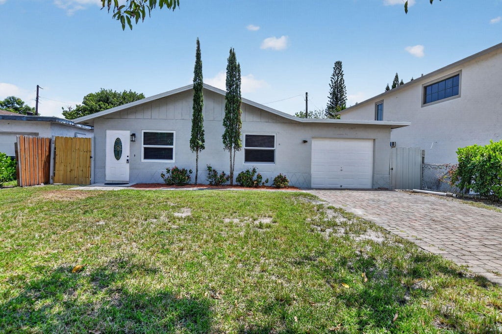 Photo of 6420 N DIXIE Highway, Boca Raton, FL 33487 (MLS # B26058968)