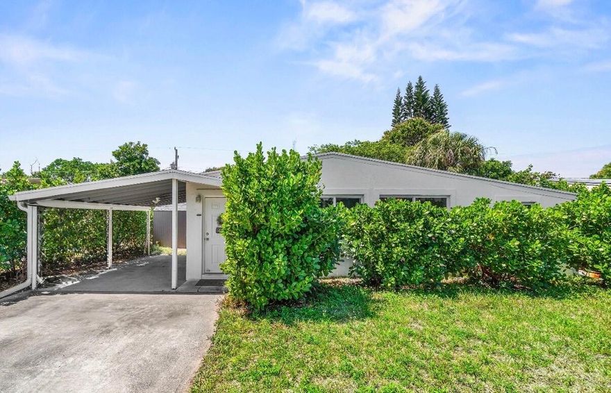 Just minutes from vibrant downtown Delray Beach, this beautifully updated 3 bedroom, 2 bath home offers the perfect blend of charm, privacy, and comfort. Surrounded by lush, private landscaping, the home creates a serene retreat. Inside you'll find a bright and inviting layout featuring tasteful updates throughout. Major improvements provide peace of mind, including a new roof (2022), impact windows and doors (2024), a new AC system (2025), a new fence (2023) and a reverse osmosis water system. This move in ready home is ideally situated just up the street from a local park and only minutes to dining, shopping, and the beach.