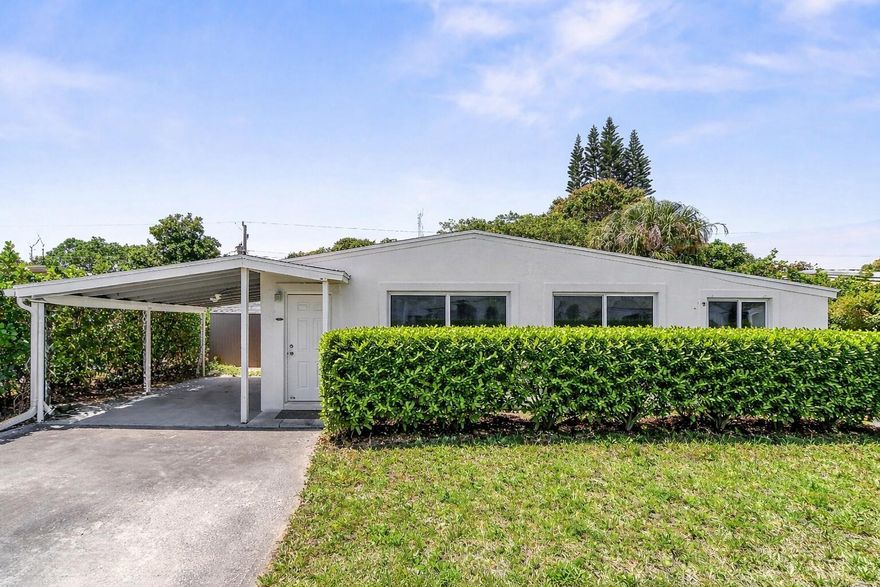 Just minutes from vibrant downtown Delray Beach, this beautifully updated 3 bedroom, 2 bath home offers the perfect blend of charm, privacy, and comfort. Surrounded by lush, private landscaping, the home creates a serene retreat. Inside you'll find a bright and inviting layout featuring tasteful updates throughout. Major improvements provide peace of mind, including a new roof (2022), impact windows and doors (2024), a new AC system (2025), a new fence (2023) and a reverse osmosis water system. This move in ready home is ideally situated just up the street from a local park and only minutes to dining, shopping, and the beach.