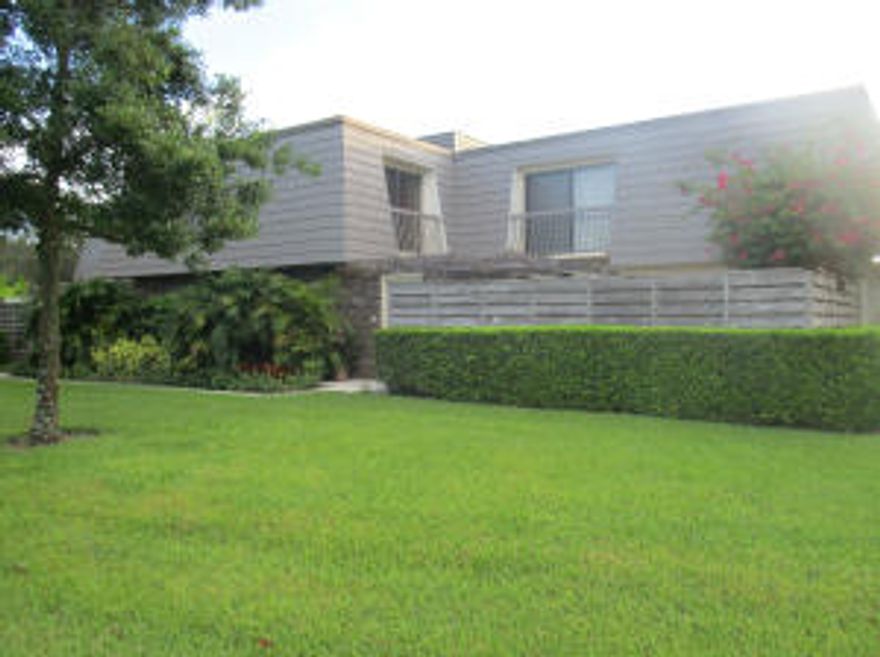 This Glenwood townhome has the best location and view in the subdivision. The view sweeps across 2 golf holes and a large lake with a fountain. 2 bedrooms plus a Den and 2.5 baths. Tranquil courtyard with no neighbors.