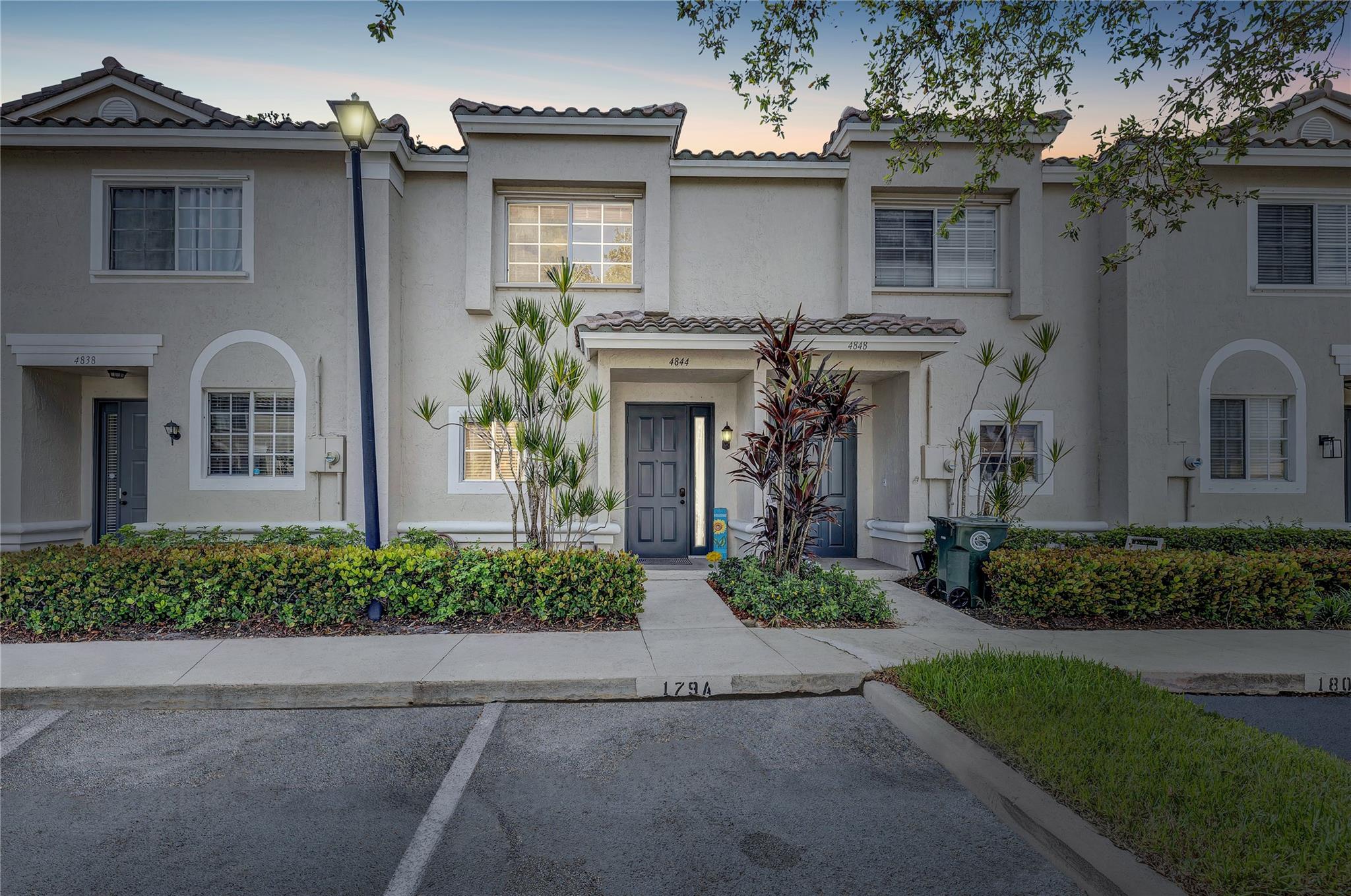 This charming 2/2 residence showcases a modern interior w/ all new stainless steel appliances, a stylish updated backsplash, & fresh paint upstairs in a contemporary tone. Enjoy the warmth of light ash wood-look tile on the 1st floor & rich hardwood flooring on the second. The property boasts a brand-new roof (2024) & has storm protection w/ panel shutters for peace of mind. Step outside to your private outdoor space w/ serene views of the Cypress Preserve—perfect for relaxing or entertaining. Community amenities include a heated pool & clubhouse, while the HOA covers common areas, exterior maintenance, lawn care, & additional insurance. The building was freshly painted in 2024, & the special assessment for the new roof will be paid at closing. Reserved parking for 2 vehicles is included.