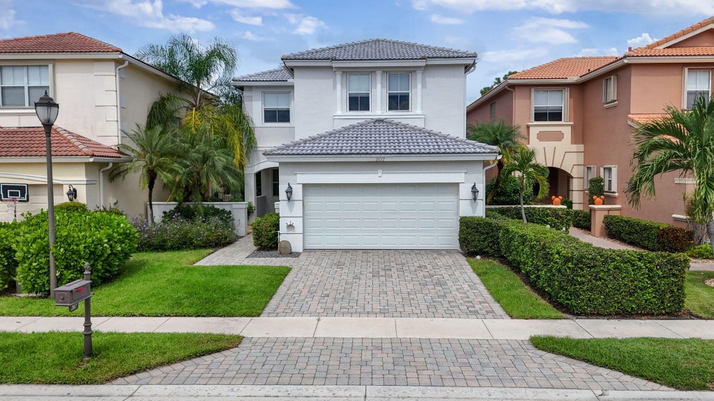 Photo of 207 ISLE VERDE Way, Palm Beach Gardens, FL 33418 (MLS # B26086943)
