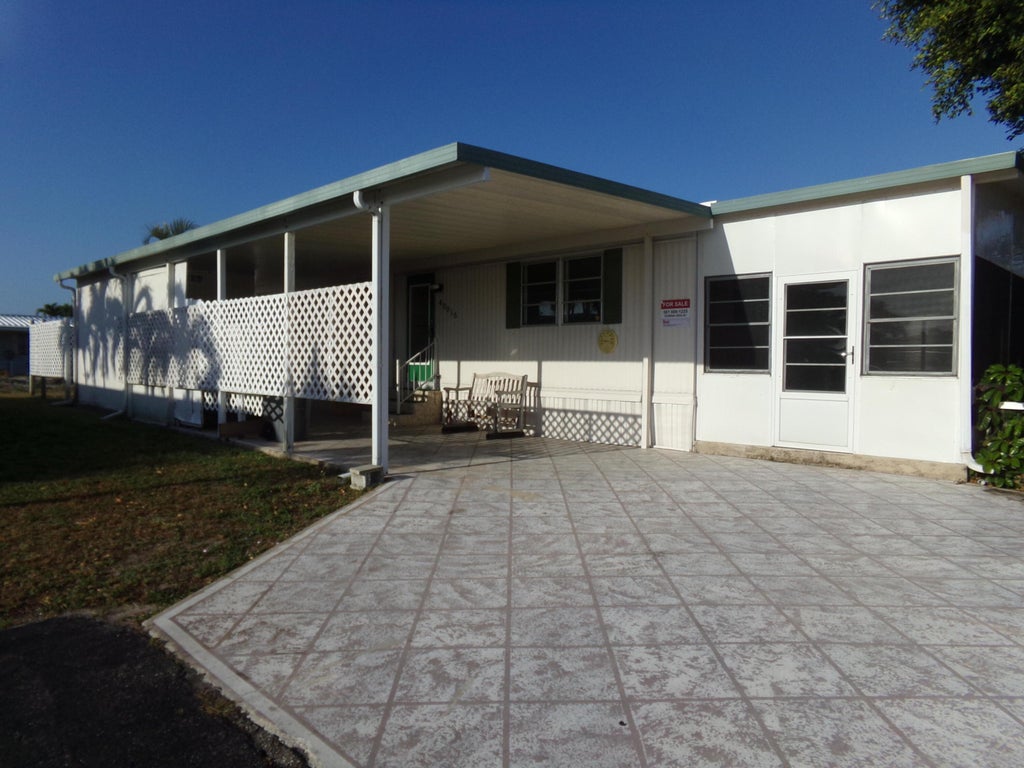 Photo of 40016 Humaco Bay, Boynton Beach, FL 33436 (MLS # R11061168)