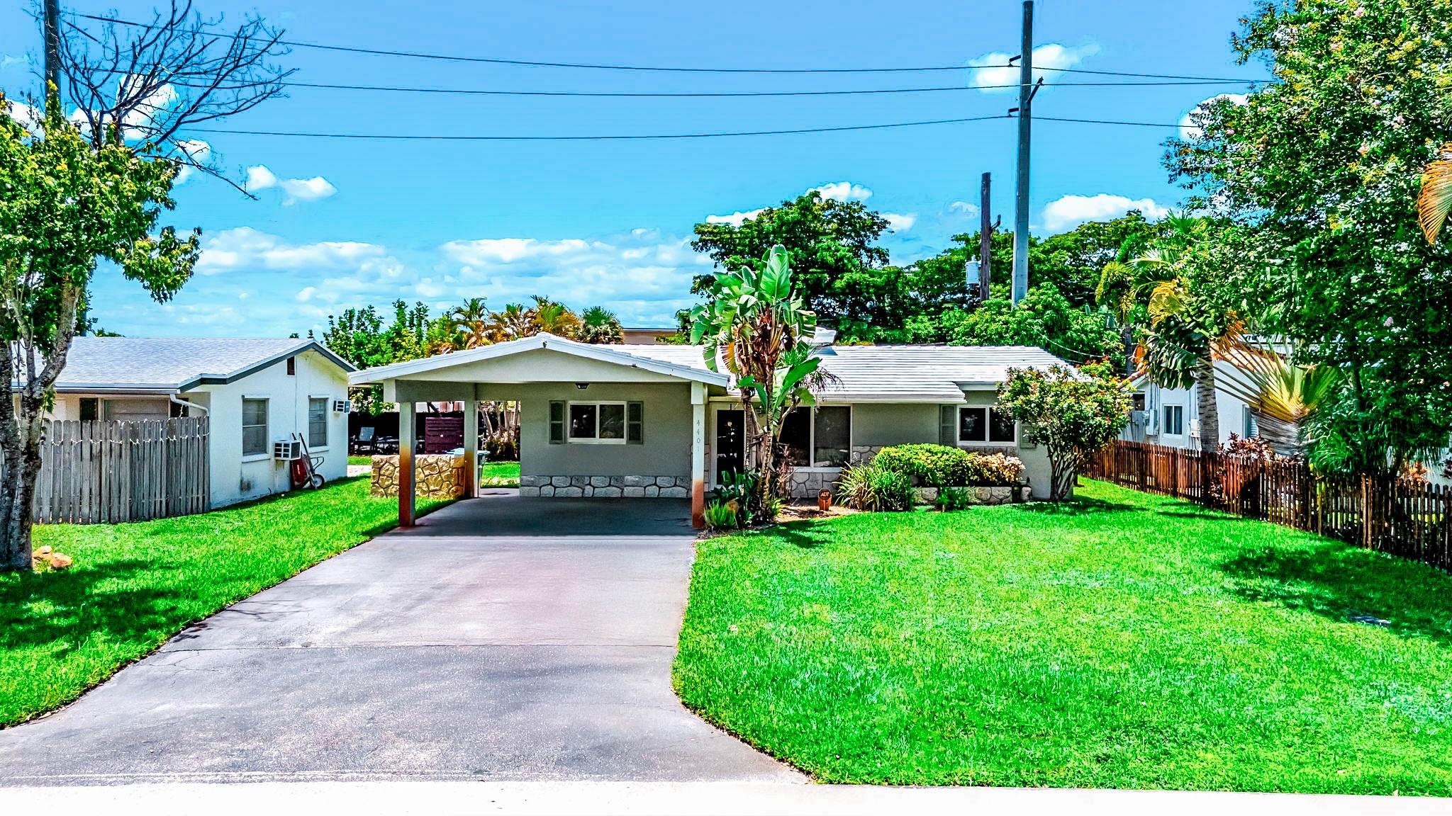 Welcome to this Coral Heights gem in Oakland Park! This 3 bedroom, 2 bath home features a desirable split floor plan, large utility room, and all impact windows and doors. The covered patio opens to a fenced yard with room for a pool, offering the perfect setup for outdoor living. A 2-car carport and wide driveway provide ample parking. Just minutes to Wilton Manors, Fort Lauderdale, beaches, local parks, coffee shops, craft breweries, and a thriving mix of restaurants, cafes, and bistros nearby. A great find in one of Oakland Park’s most loved neighborhoods.