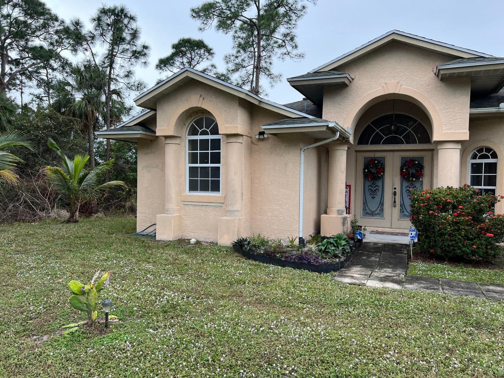 Photo of 1866 SW Lennox Street, Port Saint Lucie, FL 34953 (MLS # R11073628)