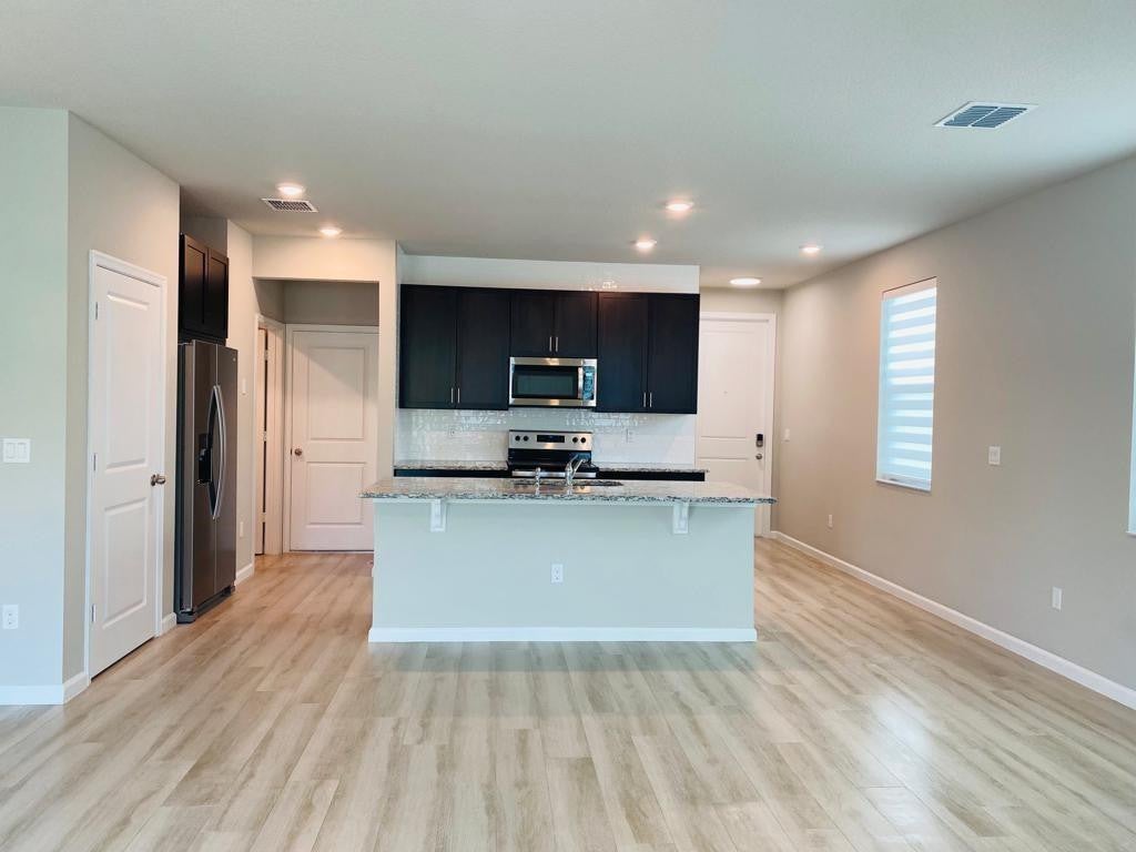 Photo of 214 Osprey Preserve Boulevard #214, Jensen Beach, FL 34957 (MLS # F10505456)