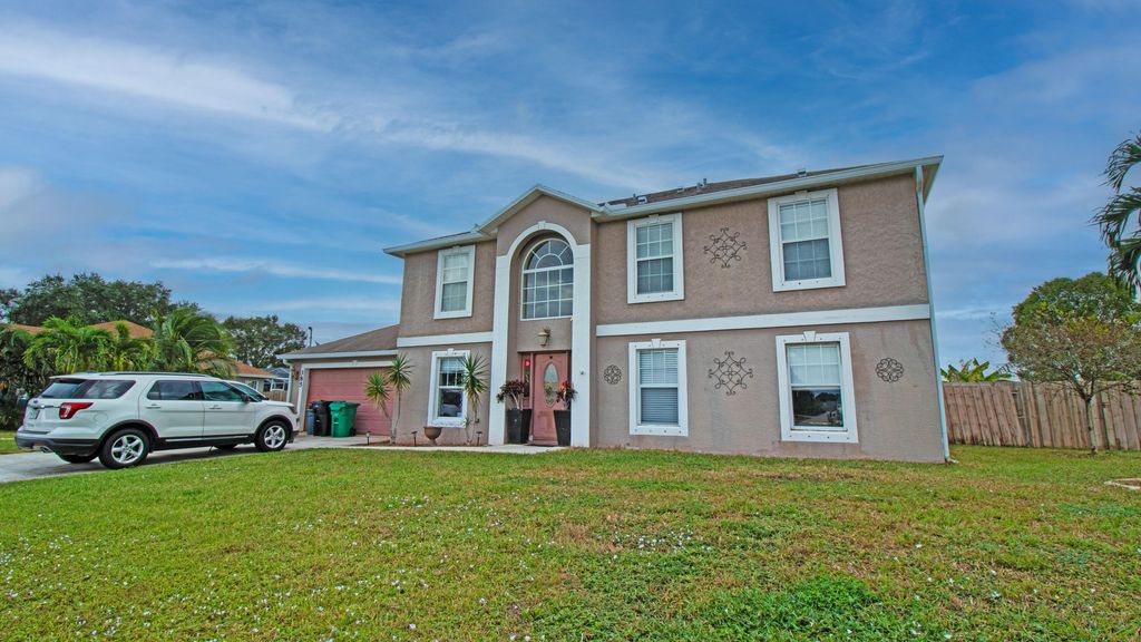 Photo of 385 SW Kestor Drive, Port Saint Lucie, FL 34953 (MLS # R10936270)