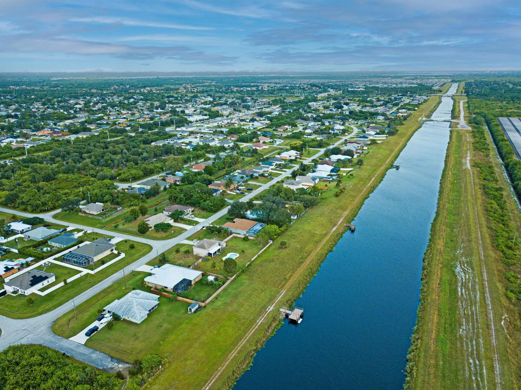 Photo of 385 SW Kestor Drive, Port Saint Lucie, FL 34953 (MLS # R10936270)