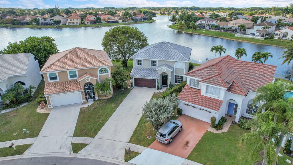Photo of 7306 Michigan Isle Road, Lake Worth, FL 33467 (MLS # R11141424)