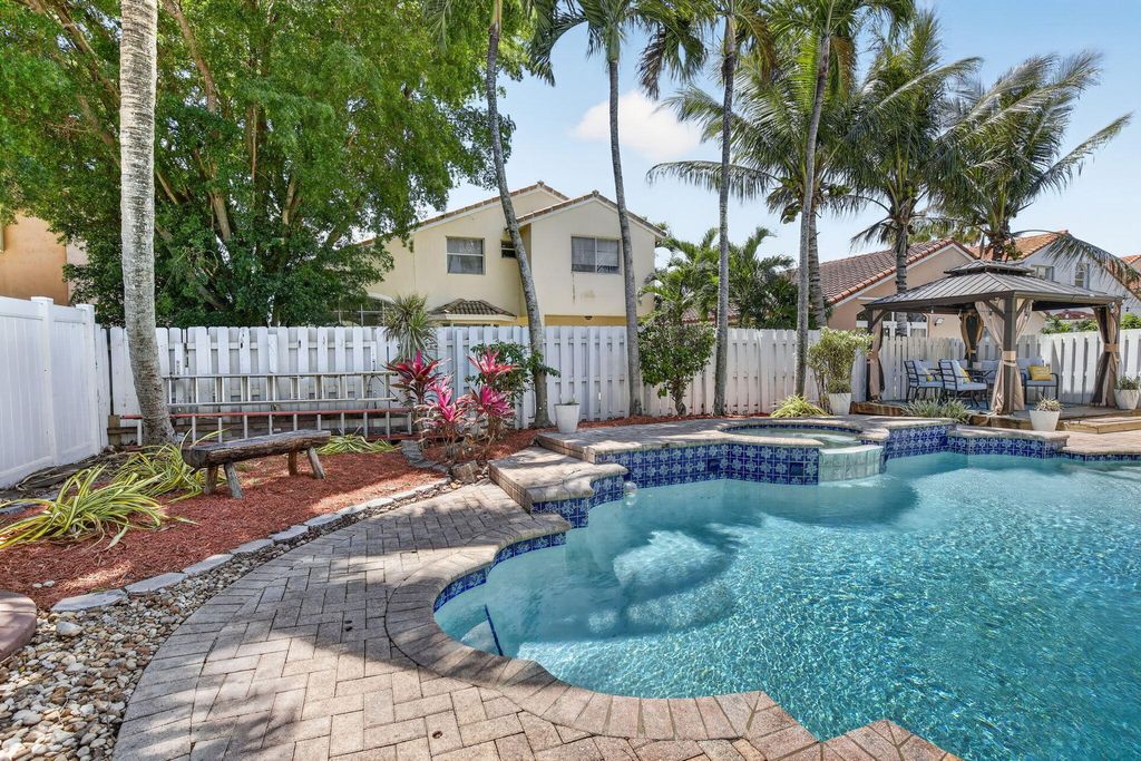 Photo of 19064 NW 13th Street, Pembroke Pines, FL 33029 (MLS # B26019276)