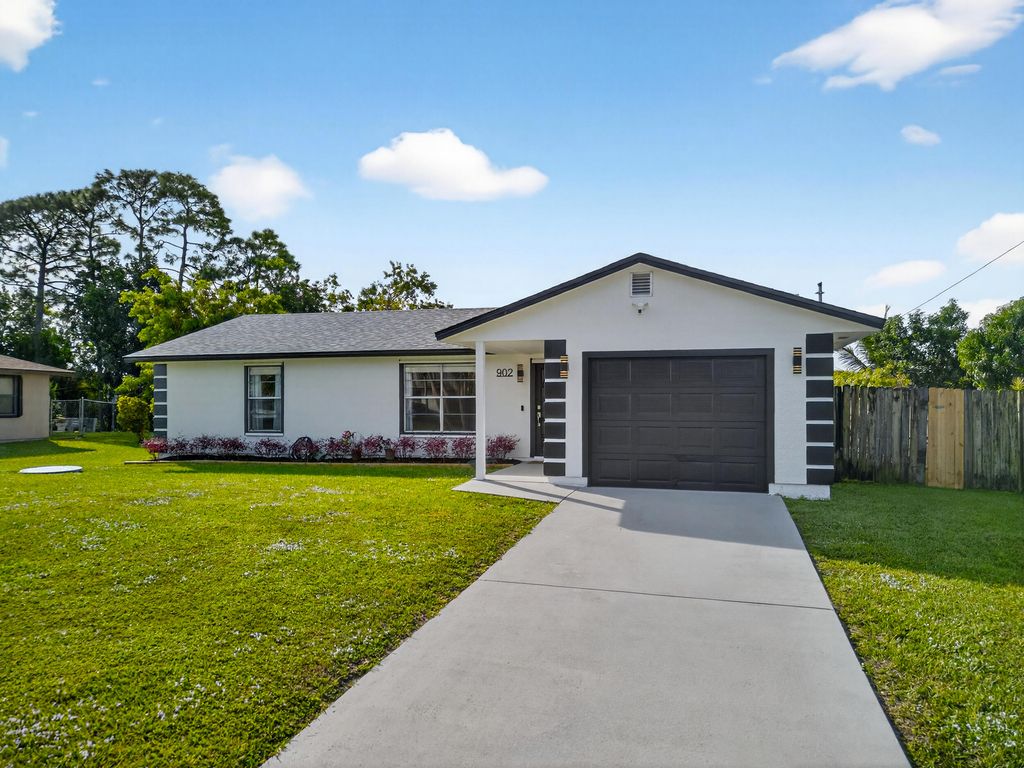 Photo of 902 SW Dalton Avenue, Port Saint Lucie, FL 34953 (MLS # R11147235)