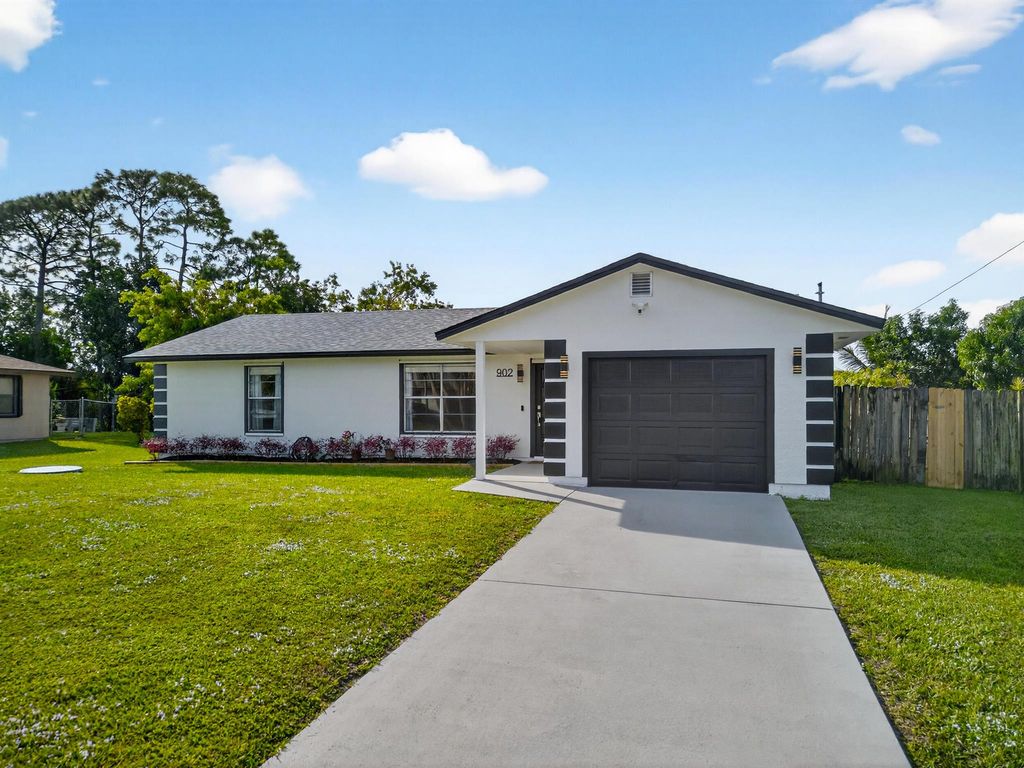 Photo of 902 SW Dalton Avenue, Port Saint Lucie, FL 34953 (MLS # R11147235)