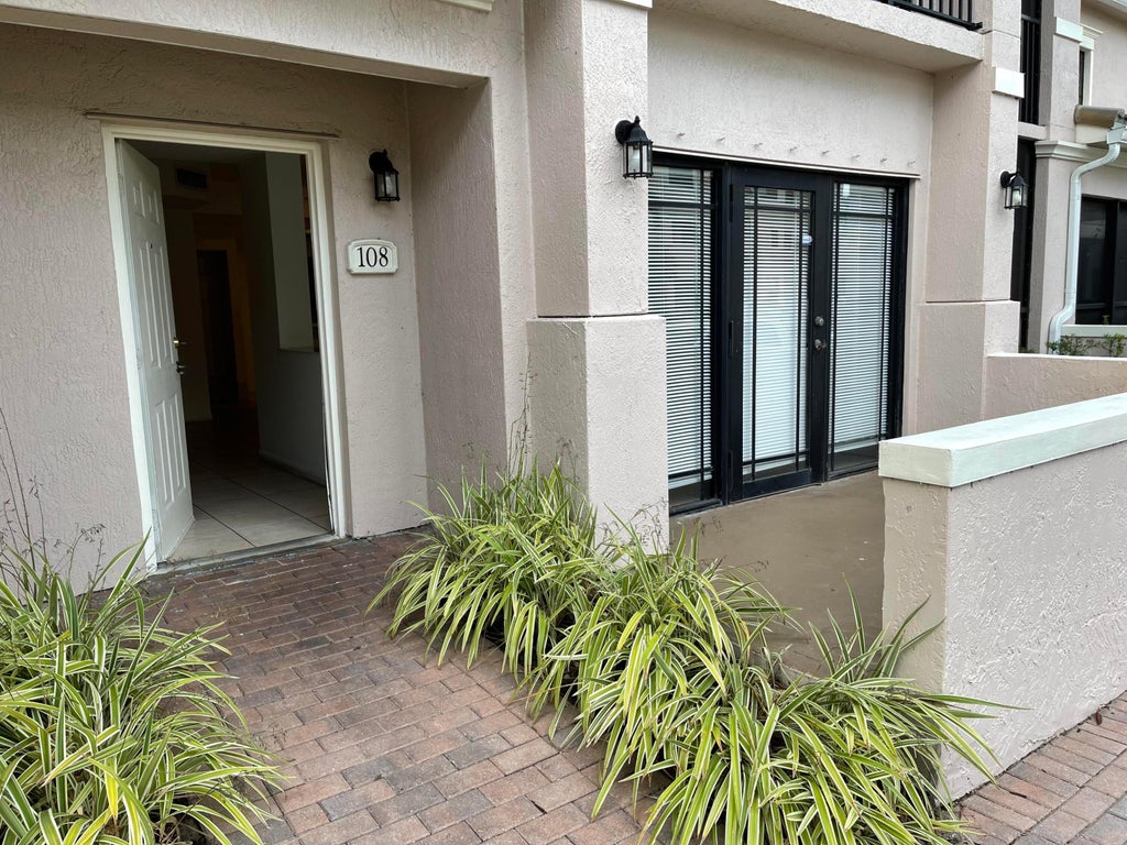 Photo of 2801 Sarento Place #108, Palm Beach Gardens, FL 33410 (MLS # R10986502)