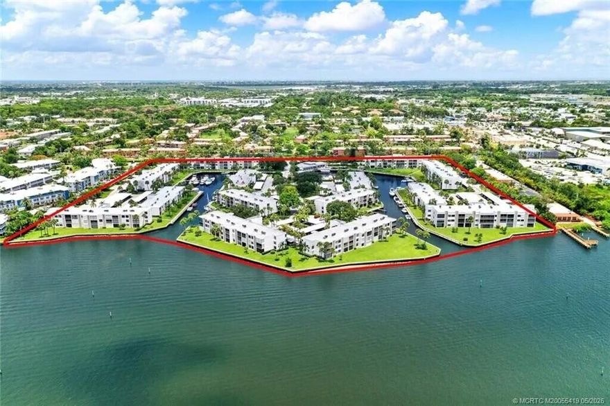 Spectacular wide water views greet you from every room in this beautifully updated 2BR/2BA riverfront condo, ideally located in a sought-after boating community of Circle Bay Yacht Club, just minutes from downtown Stuart. Boater's dream with Dockage available for boats up to 36ft.for $2/ft/mo. & Ocean Access! Designed for both comfort and style, this stunning condo features hurricane-impact windows & floor-to-ceiling impact sliding glass doors that showcase the expansive waterfront scenery and fill the space with natural light. Contemporary finishes and a refined coastal aesthetic create an inviting, move-in-ready retreat. Enjoy a full suite of resort-style amenities, including a sparkling pool, hot tub, sauna, boardwalk, picnic deck, vegetable garden, workshop, and clubhouse.