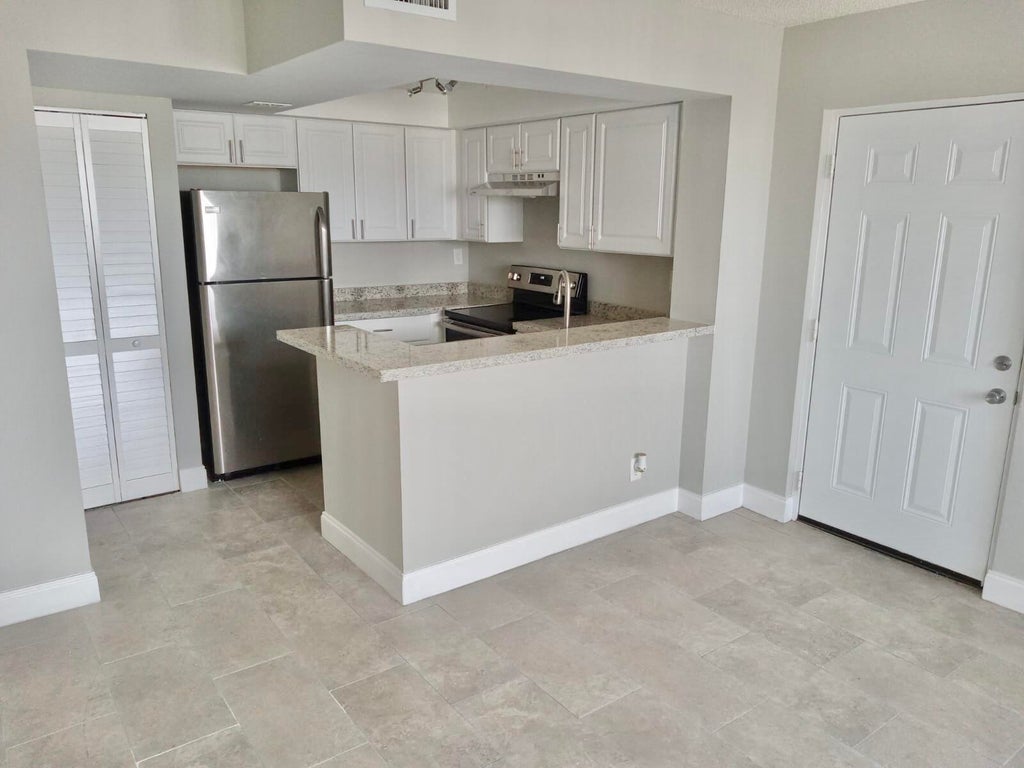 Photo of 738 Executive Center Drive #32, West Palm Beach, FL 33401 (MLS # B26070666)