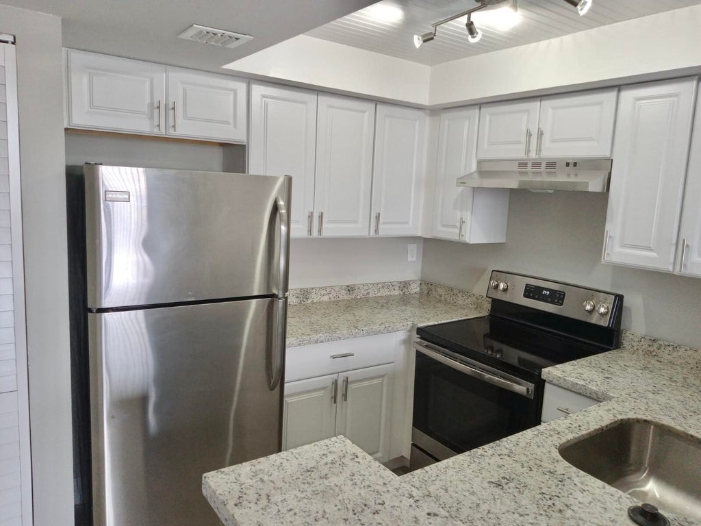 Photo of 738 Executive Center Drive #32, West Palm Beach, FL 33401 (MLS # B26070666)