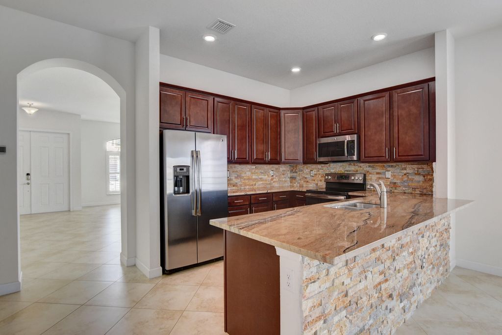 Photo of 8835 Sandy Creek Way, Lake Worth, FL 33467 (MLS # B26025690)