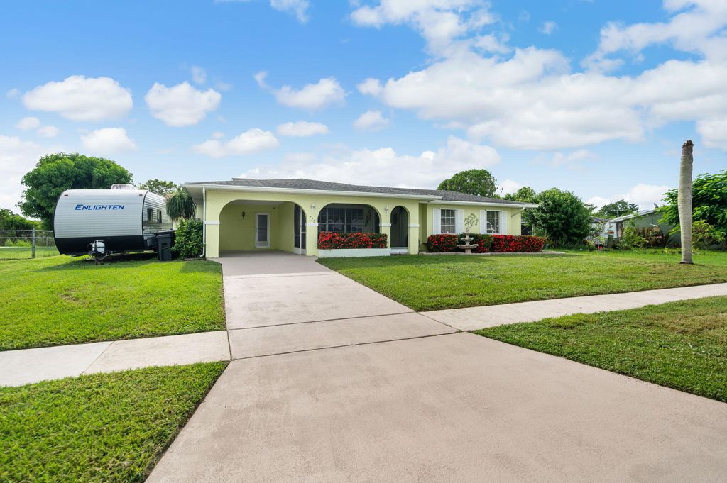 Photo of 775 SW Goodrich Street, Port Saint Lucie, FL 34983 (MLS # R11108092)