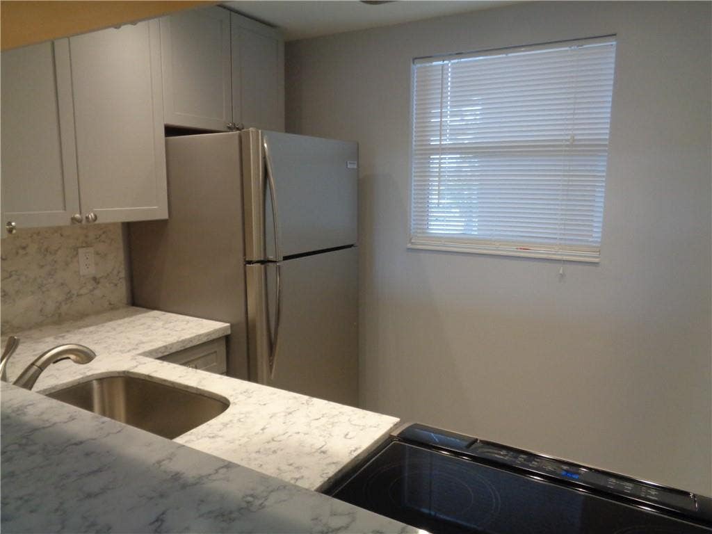 Photo of 1777 SE 15th Street #218, Fort Lauderdale, FL 33316 (MLS # B26047584)