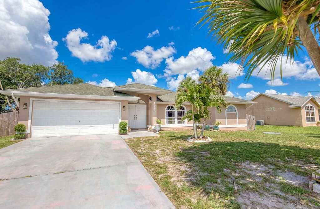 Photo of 1968 SW Capeador Street, Port Saint Lucie, FL 34953 (MLS # R10723485)