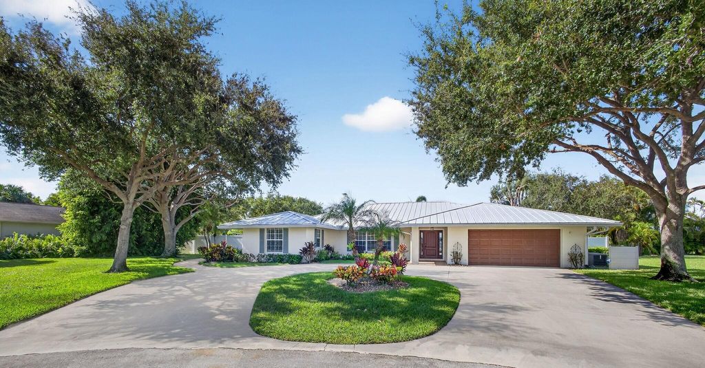 Photo of 4598 Juniper Lane, Palm Beach Gardens, FL 33418 (MLS # R11118891)