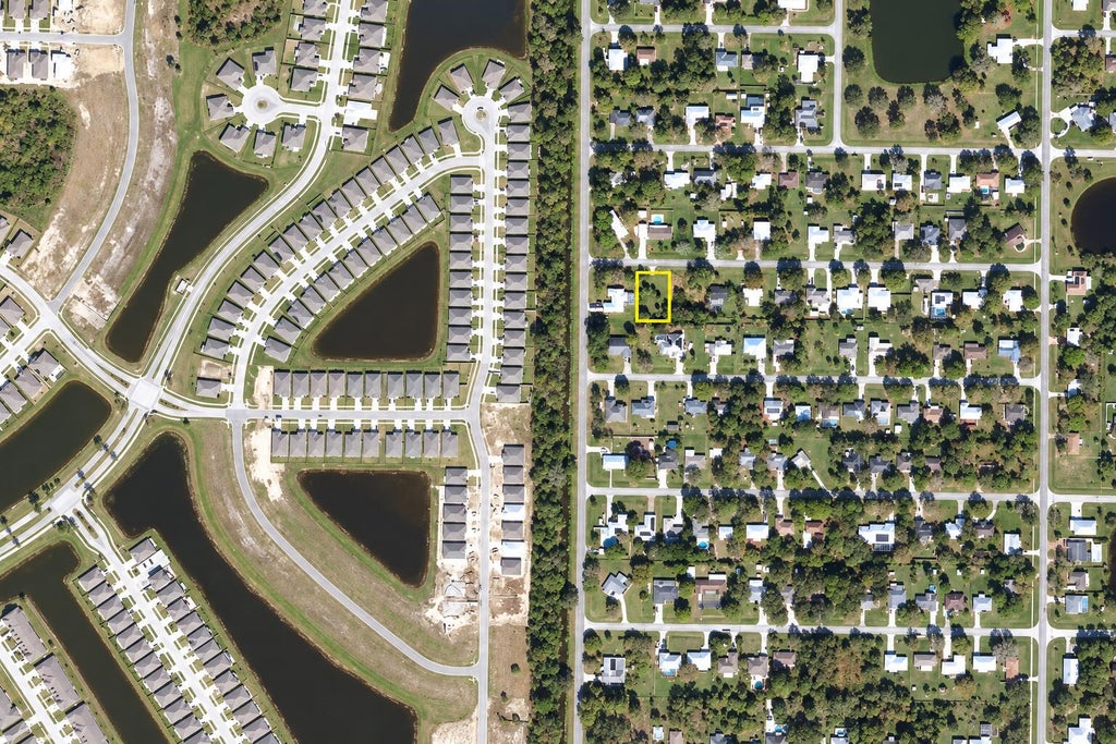 Photo of 8003 Lockwood Drive, Fort Pierce, FL 34951 (MLS # B26077393)