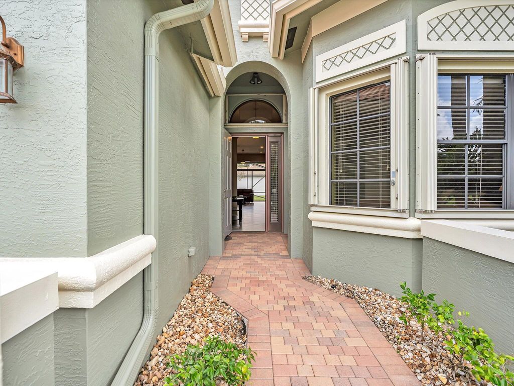 Photo of 9577 Isles Cay Drive, Delray Beach, FL 33446 (MLS # B26013533)