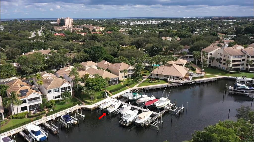 Rare opportunity for private dock w/ 20,000lb lift in Juno Beach, direct Intracoastal, protected by barrier island. Up to 34' boat, dock box included. The vessel must fit into the slip without encroaching out into the waterway.Ocean access, No fixed bridges, located between Palm Beach Inlet & Jupiter Inlet. Hi Tide lift with remote installed w/ new power run in 2019. Not required to own a home in Oak Harbour, but non-residents pay additional $764.85/qtr to (Master POA) plus $418.10 (Marina Fee) Gated community w/ 24/7 security. Clubhouse access includes personal use & access to free ice machines (8-300lb capacity). Prime location close to clubhouse, carts & parking. HOA includes water/electric. No live-aboards. Community residents have 1st right of refusal for 60 days.