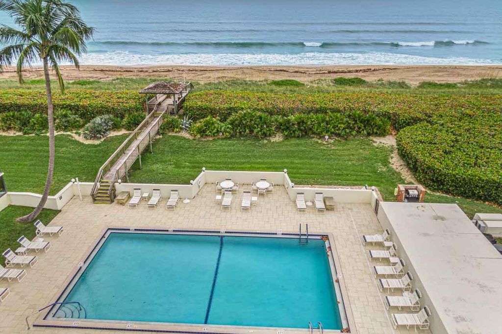 Photo of 10044 S Ocean Drive #105, Jensen Beach, FL 34957 (MLS # R10885631)