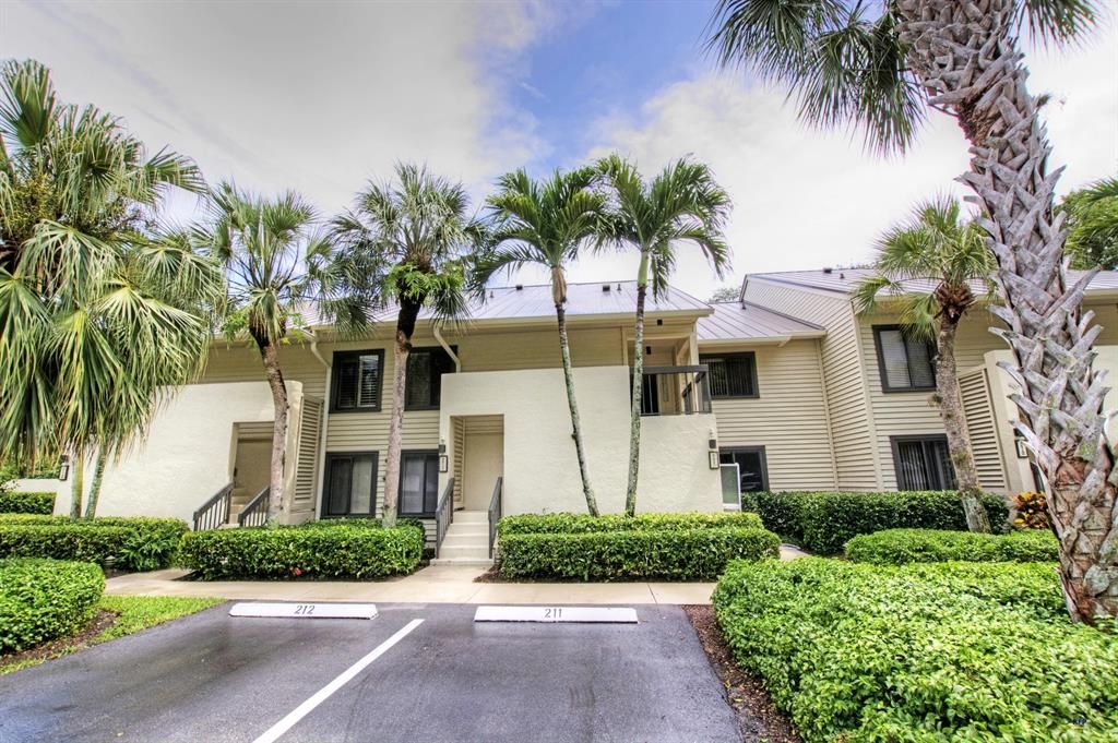 Photo of 5192 SE Club Way #211, Stuart, FL 34997 (MLS # R10598456)