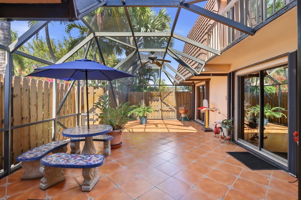 Photo of 9 Atrium Circle #C, Atlantis, FL 33462 (MLS # B26003155)