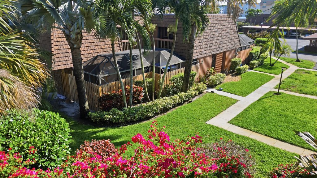 Photo of 9 Atrium Circle #C, Atlantis, FL 33462 (MLS # B26003155)