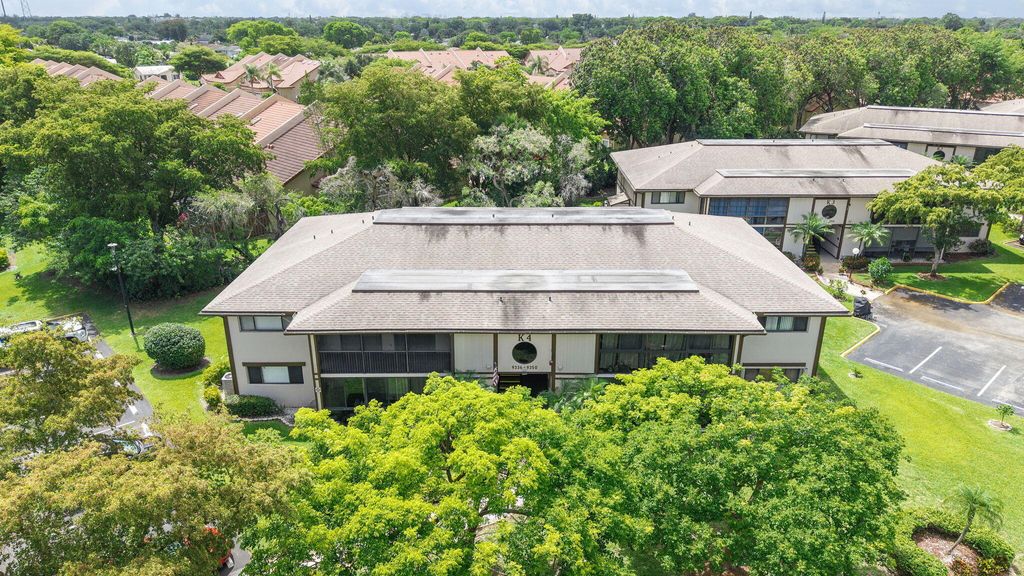 Photo of 9342 S Belfort Circle #214, Tamarac, FL 33321 (MLS # B26032460)