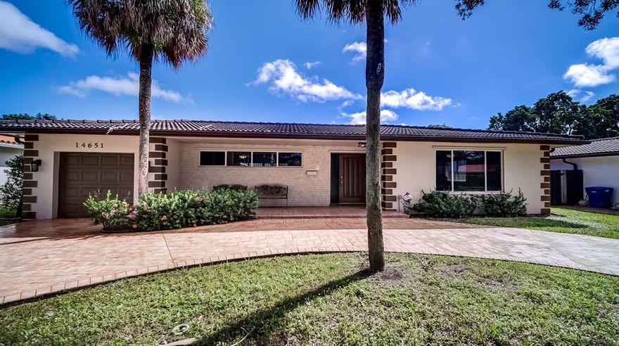 THE ENTERTAINERS HOUSE WITH AN AMAZING LOCATION! THIS 3BR/2BA 2,294 SQ FT HOME IN MIAMI LAKES IS COMPLETELY REMODELED WITH U-SHAPED DRIVEWAY AND 1 CAR GARAGE. NEWER EXTERIOR PAINT AND NEW EXTERIOR LIGHT FIXTURES. ALL NEW PLUMBING. NO CAST IRON PIPES!! SPACIOUS TILED FRONT PATIO AND RAIN GUTTERS. COMPLETE SET OF HURRICANE PANELS. BRAND NEW KITCHEN WITH OVERSIZED ISLAND!! SOFT CLOSE CABINETS W/ PANTRY AND QUARTZ COUNTERTOPS. STAINLESS STEEL APPLIANCES. ALL NEW CEILING FANS AND LIGHT FIXTURES. RECESSED LIGHTING, MODERN TILE WOOD FLOORS WITH BRAND NEW BASEBOARDS THROUGHOUT. ALL NEW INTERIOR PAINT. DOUBLE DOOR SLIDER IN FAMILY ROOM OPENS UP TO A 500 SQ FT SCREENED, PARTIALLY COVERED PATIO PERFECT FOR OUTDOOR ENTERTAINING. BACKYARD HAS PLENTY OF ROOM FOR A POOL. UPDATED CABANA BATH WITH NEW TILE SHOWER AND SOAKER TUB COMBINATION. MASTER BEDROOM WITH WALK IN CLOSET & EN SUITE. DUAL VANITY SINKS WITH QUARTS COUNERTOPS, SEEMLESS GLASS DOOR TILED SPA SHOWER. UPDATED ELECTRICAL PANEL, GAS HOT WATER HEATER, SPRINKLER SYSTEM WITH ALL NEW SPRINKLER HEADS, TILE ROOF, PULL DOWN STEP LADDER FOR ATTIC, AUTOMATIC GARAGE DOOR OPENER, COMMUNITY PARKS/PLAYGROUNDS THROUGHOUT THE NEIGHBORHOOD. NO HOA! MINUTES TO SHULA'S GOLF CLUB, SHULA'S ATHLETIC CLUB, MIAMI LAKES BUSINESS PARK, DOWNTOWN MAIN STREET, MIAMI LAKES MEDICAL CENTER, MIAMI-DADE POLICE DEPARTMENT, MIAMI LAKES K-8 CENTER, 826/PALMETTO EXPRESSWAY, I-75, FL-TURNPIKE, SAWGRASS EXPRESSWAY, SHOPPING, RESTAURANTS, AND MUCH MORE!!!! NOT TO BE MISSED. BY APPOINTMENT ONLY. SEE BROKER REMARKS