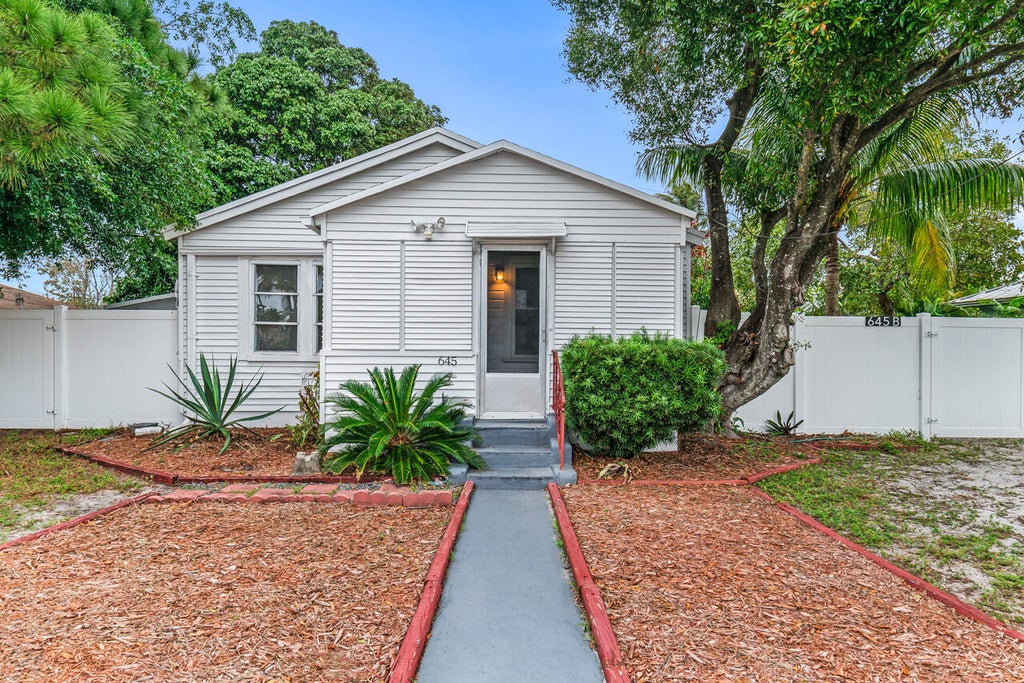 Photo of 645 NE 38th Street #A, Oakland Park, FL 33334 (MLS # B26079016)