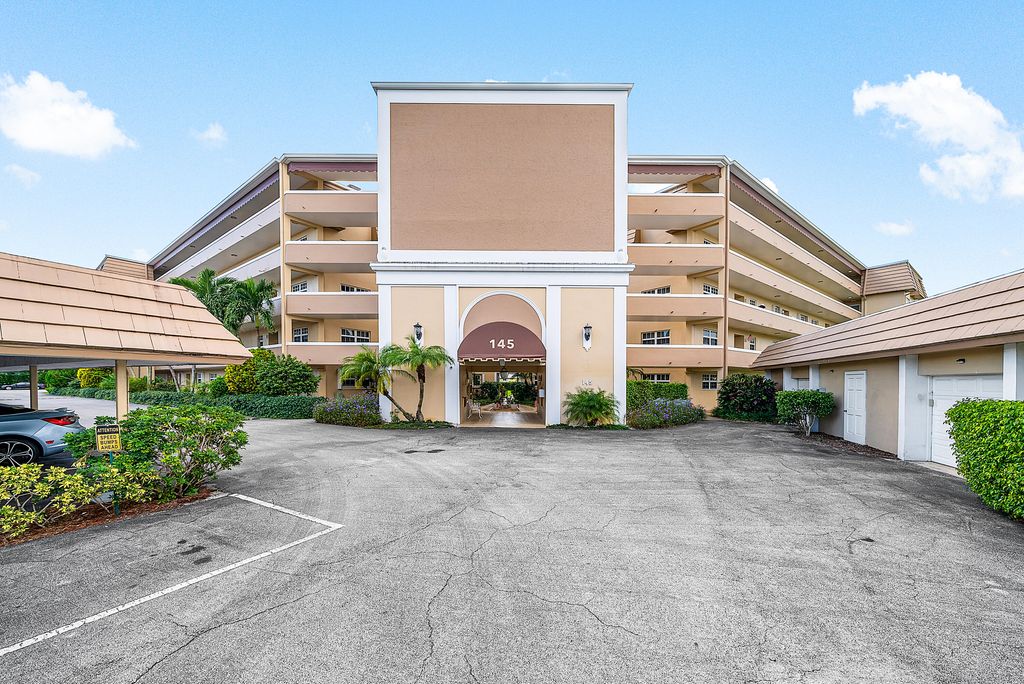 Photo of 145 Atlantis Boulevard #203, Atlantis, FL 33462 (MLS # R11129309)