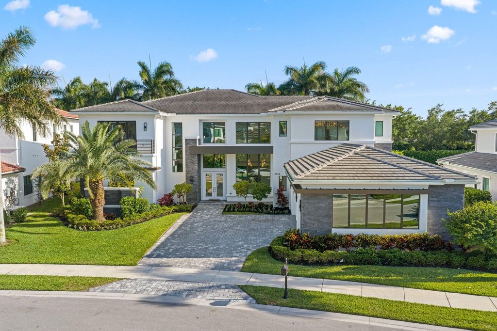 Photo of 2702 NW 71st Boulevard, Boca Raton, FL 33496 (MLS # B26027097)